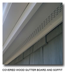 picture of a covered wood gutter board and soffit